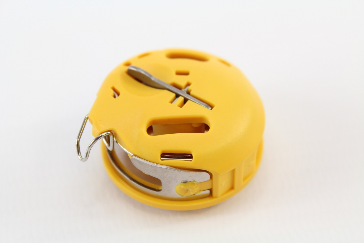 Original Bernina Spulenkapsel (gelb) Original Bernina Spulenkapsel (gelb)