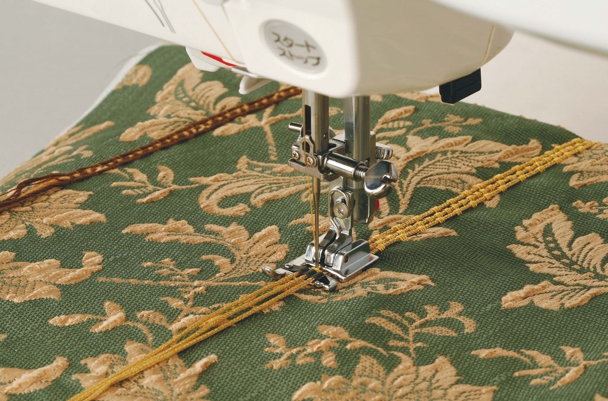 ELNA / JANOME Kordelaufnähfuss H (7mm Stichbreite) ELNA / JANOME Kordelaufnähfuss H (7mm Stichbreite)