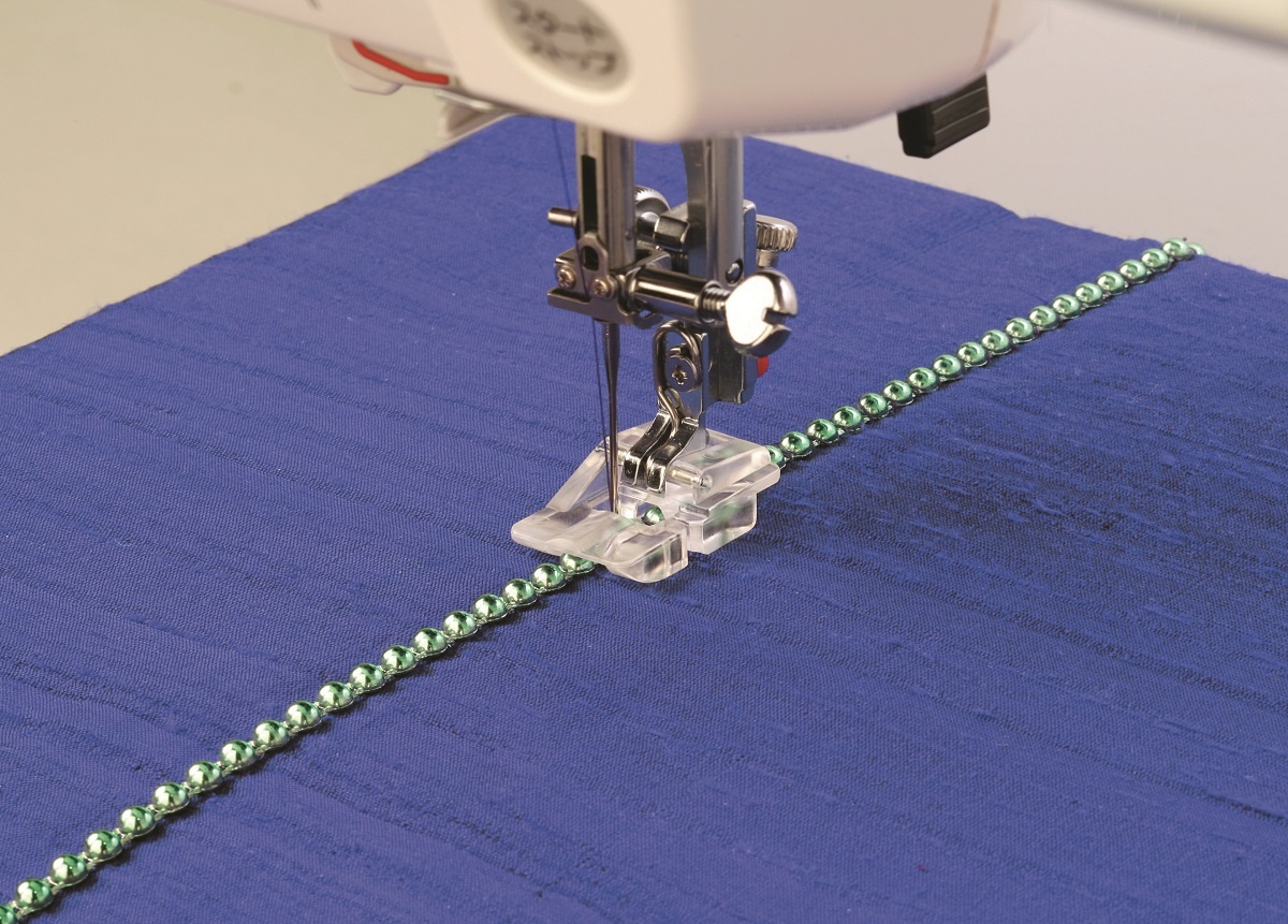 ELNA / JANOME Perlenaufnähfuss für Perlen in der Größe von 2,5 mm bis 4 mm ELNA / JANOME Perlenaufnähfuss für Perlen in der Größe von 2,5 mm bis 4 mm